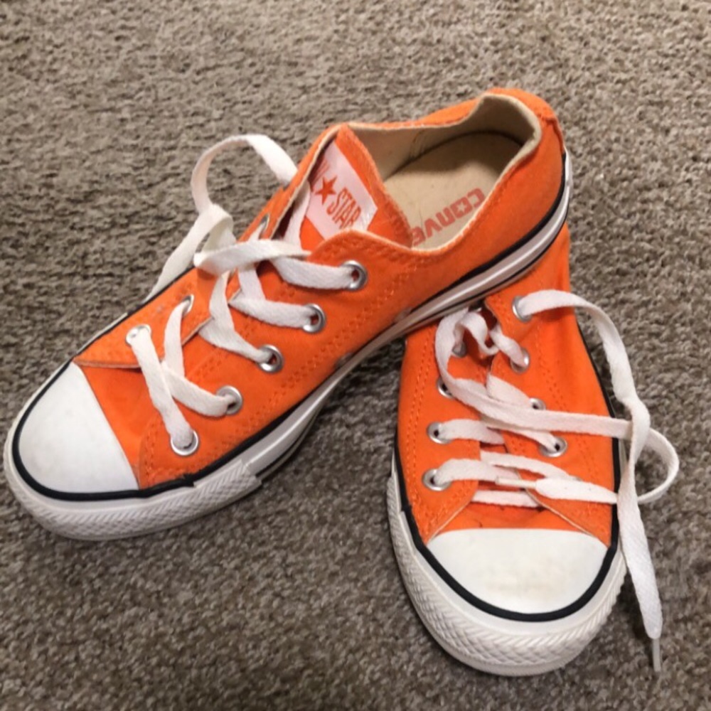 Orange converse low tops